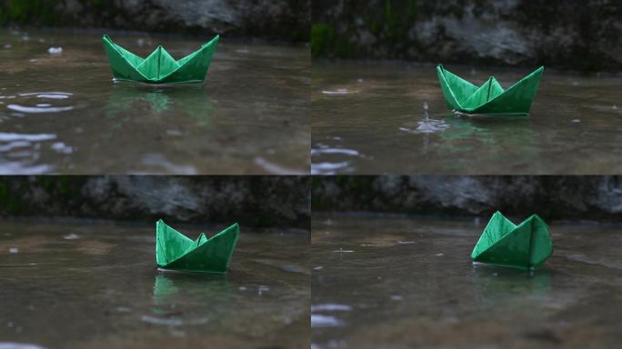 彩纸船浮于水面折纸船小雨
