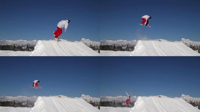 滑雪板运动员在滑雪场中跳跃