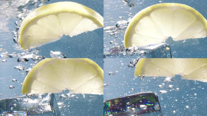 柠檬片和冰块掉进水中