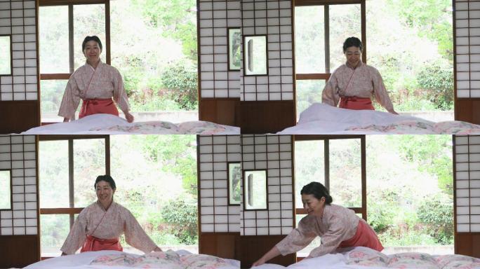 日本妇女制作传统的蒲团床