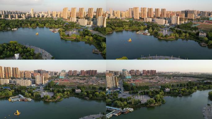 4K航拍俯拍环绕城市湖泊公园绿化房地产