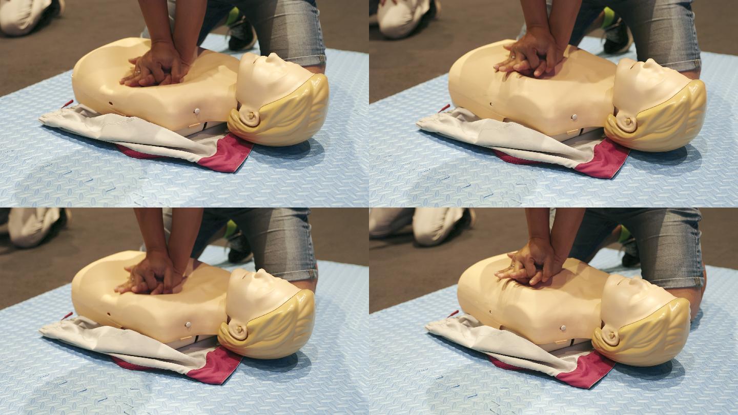 心肺复苏培训班展示了在假人上抽水、急救或医疗保健概念。