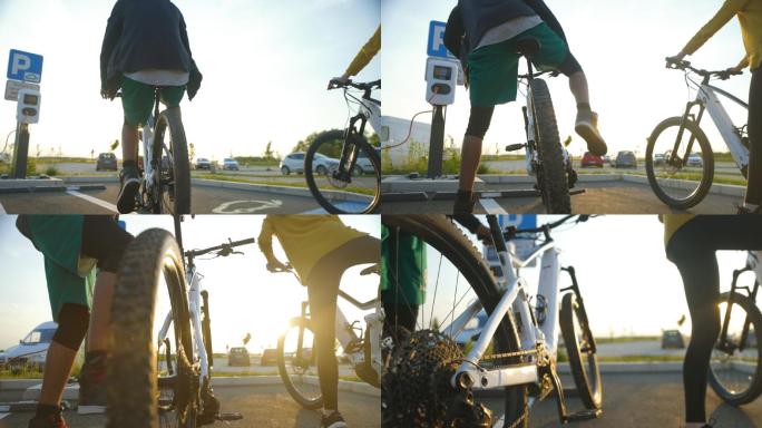 两名身份不明的骑手在电动汽车充电站停放自行车