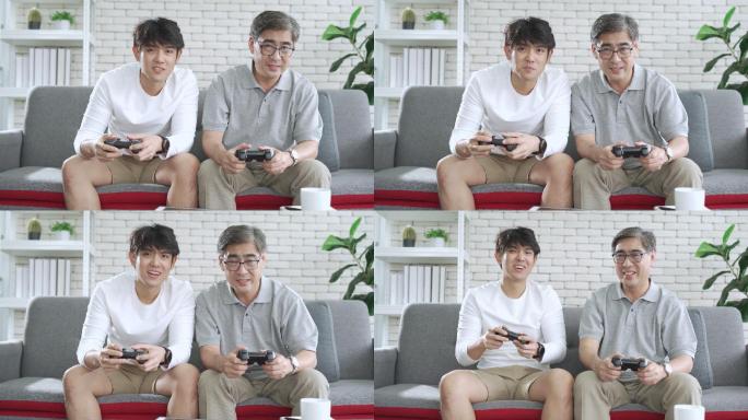 亚洲资深父亲和他的成年儿子喜欢在家里的客厅里一起玩电子游戏，享受，电子游戏，父母，家人
