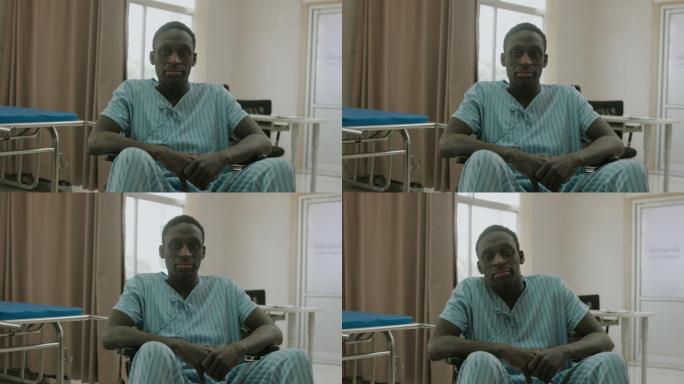 坐在医院轮椅上的非洲患者。