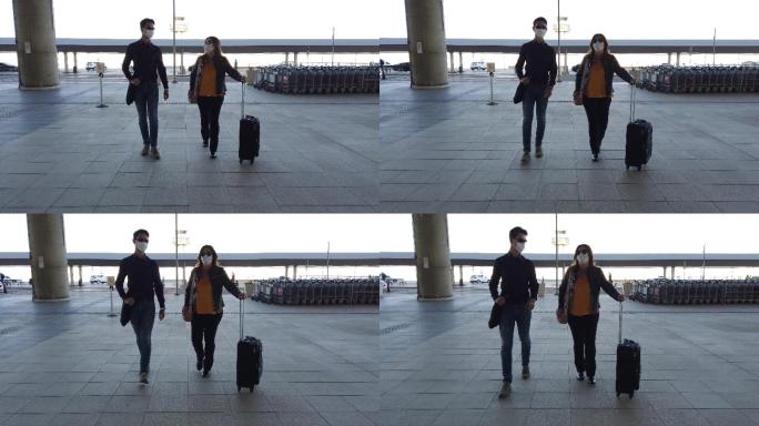 一男一女抵达机场。旅行者