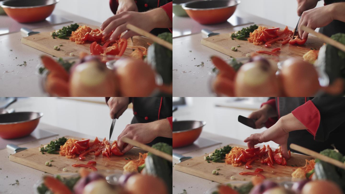 专业厨师用锋利的菜刀切碎红甜椒