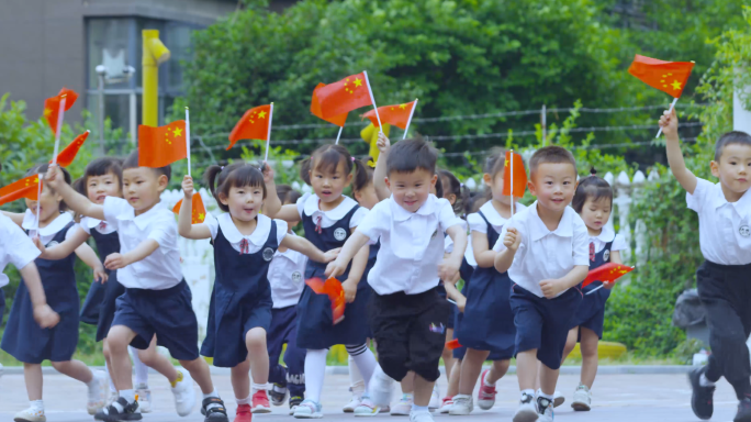 4k儿童拿国旗奔跑国庆六一儿童节未来希望