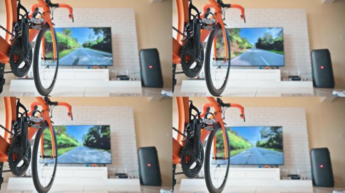 室内自行车虚拟现实活动电视屏幕前的公路自行车