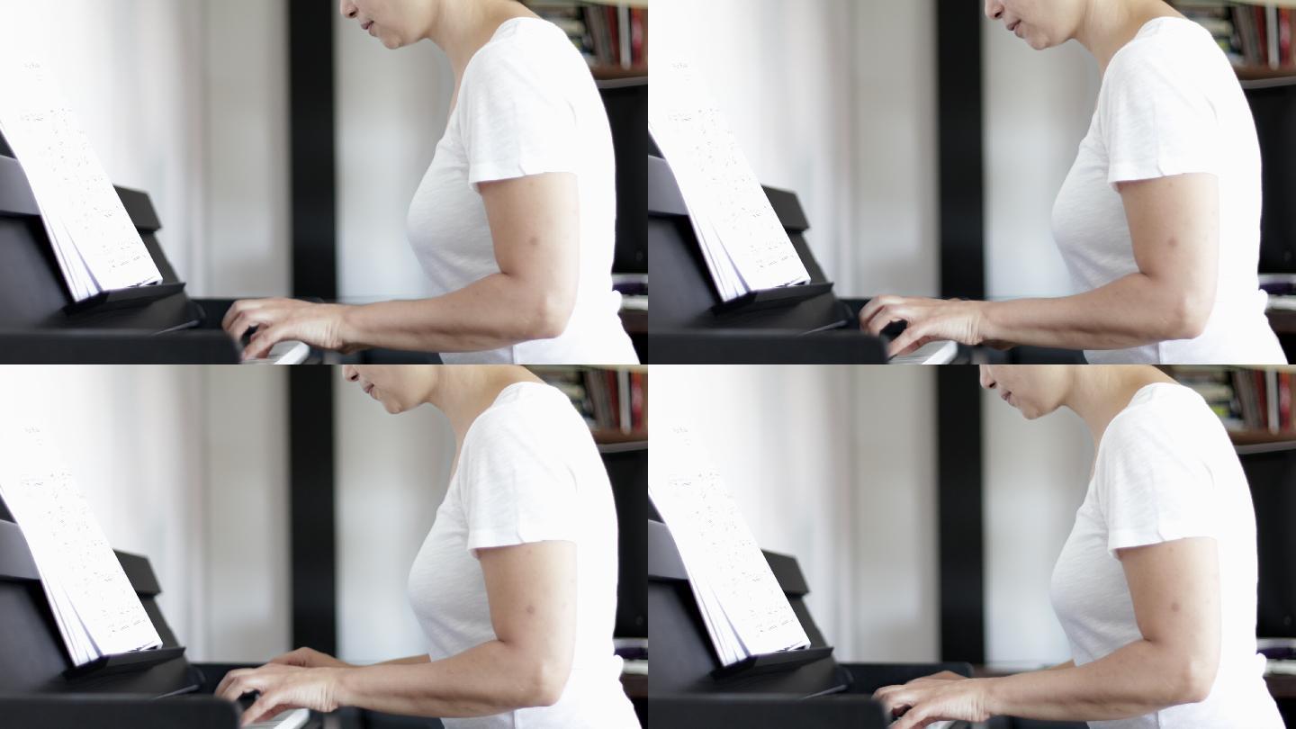 女性弹钢琴，与音乐的和谐融为一体