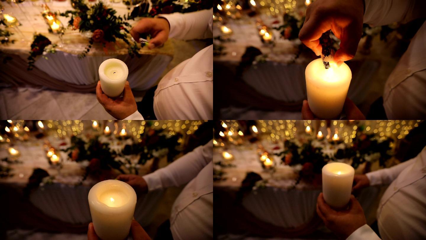 服务员为新婚之夜点燃蜡烛装饰物