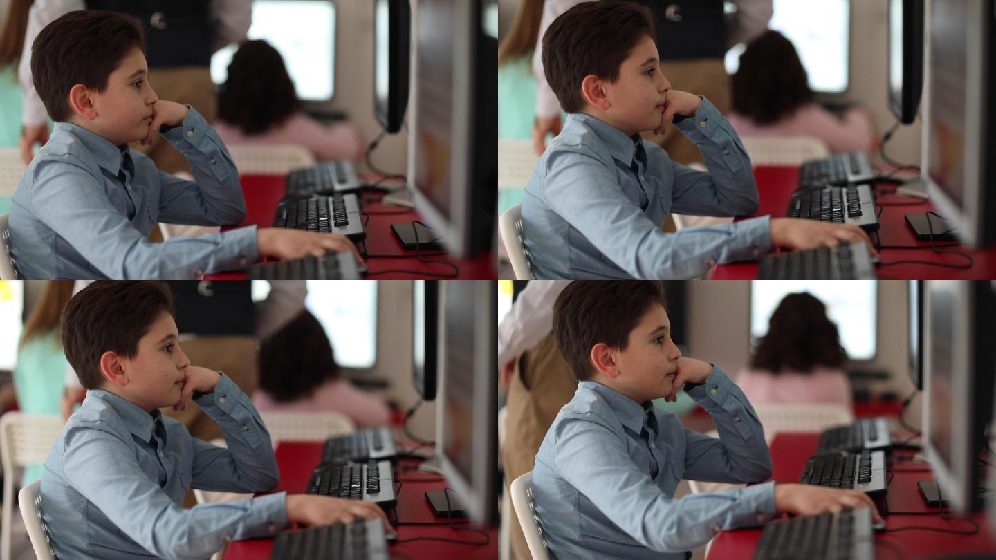 私立学校计算机课男生使用计算机