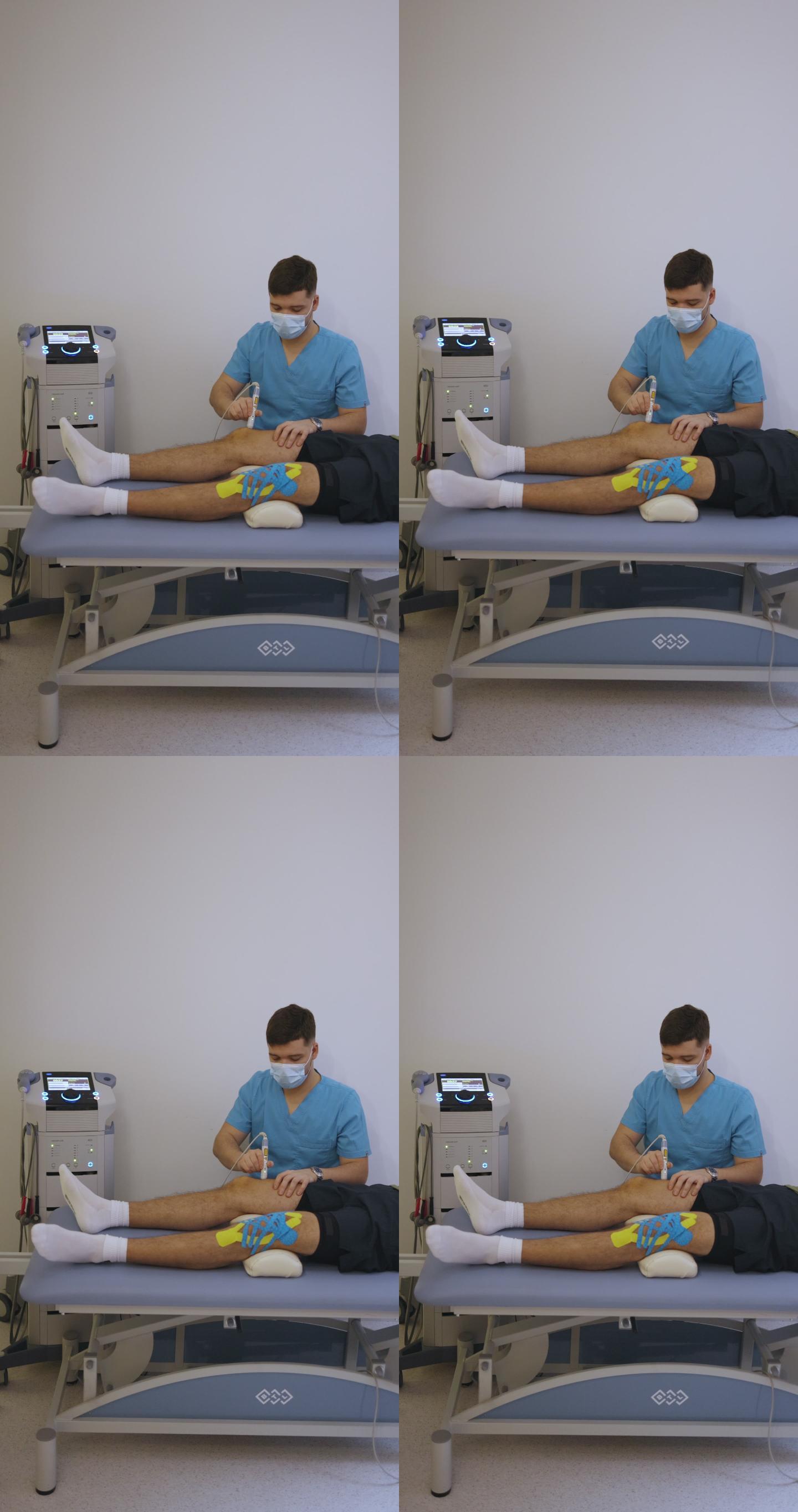 医生手持冲击波激光对患者膝盖进行治疗