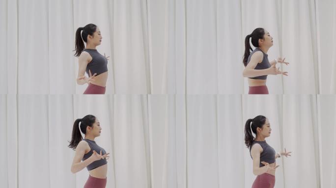 日本年轻女性在现代舞中穿瑜伽服