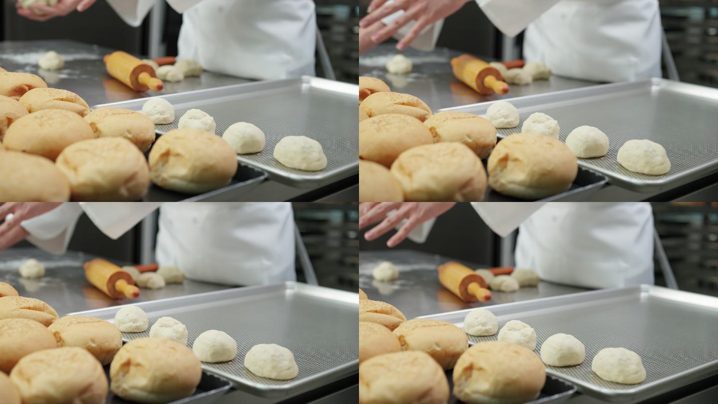 淘金：从烤箱里烤出的面包和托盘上等待发酵的圆形面团，厨师揉捏和准备面团，在商业烘焙厨房制作面包和面包