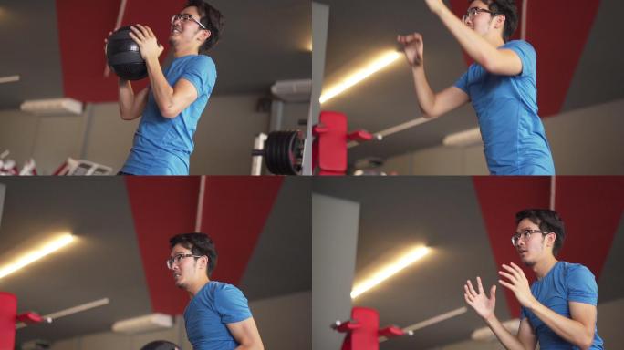 斯洛·莫（SLO MO）-亚洲瘦子在健身房抛球锻炼身体