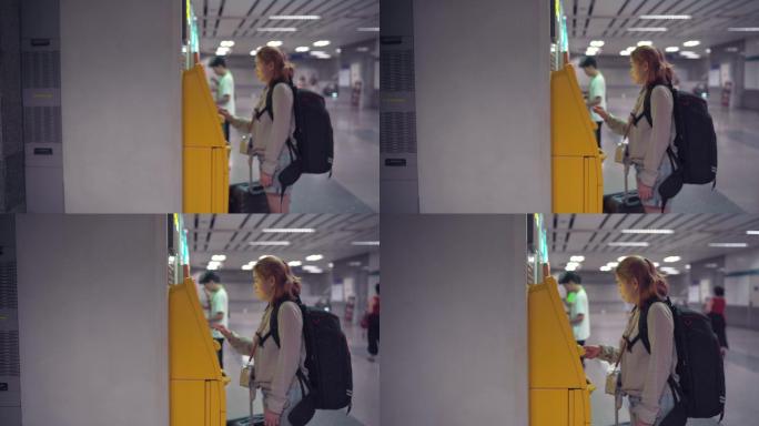 4K镜头：妇女们提着大包走进自动取款机的钱袋。