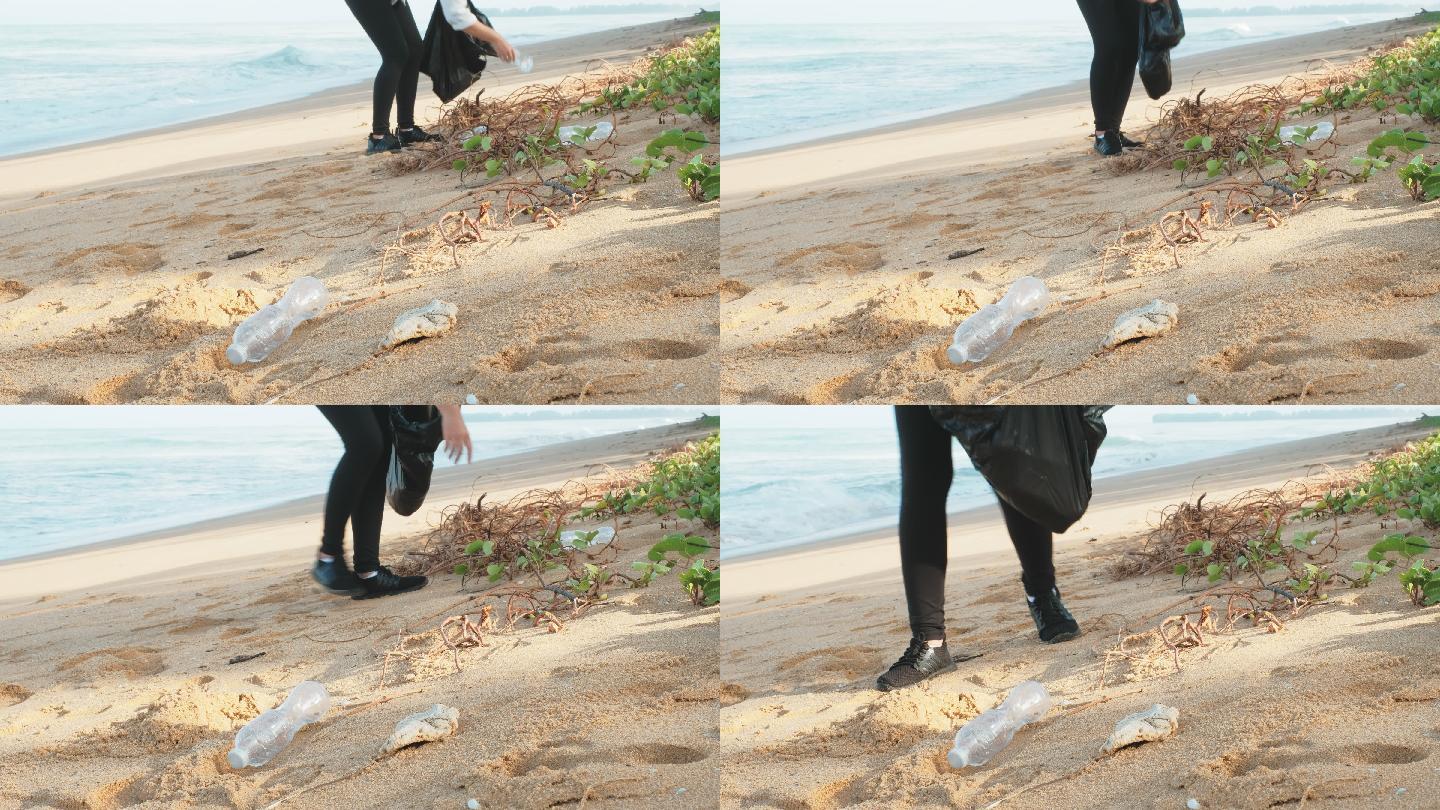 在海滩上清洁年轻女子和收集垃圾。