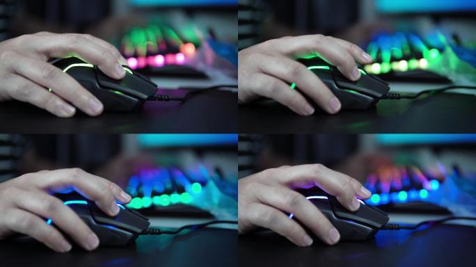 双手使用电脑鼠标。