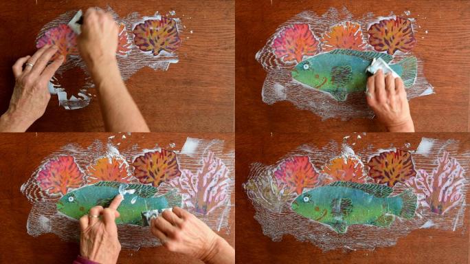 用胶粘纸拼贴海草和鱼