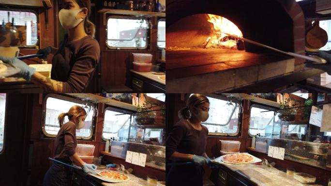 繁忙的小型披萨生意：年轻女子将披萨装进砖砌烤箱