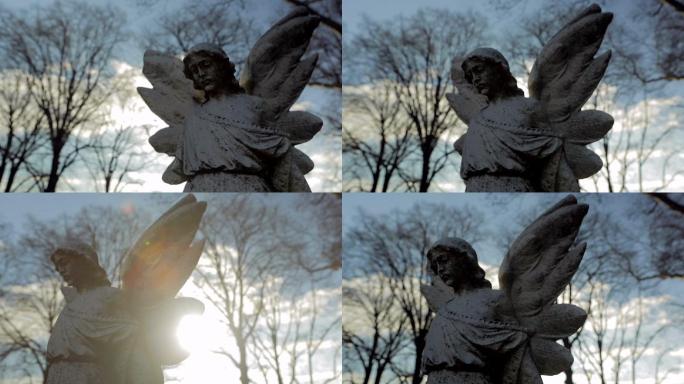 日落天使雕像，美丽的太阳耀斑慢镜头