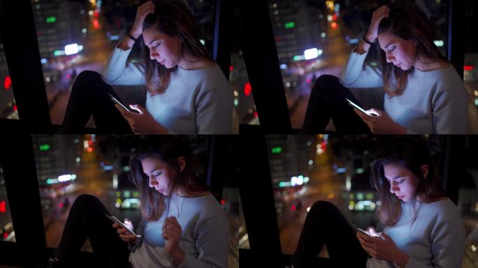 少女伤心女人坐窗边玩手机看手机的女人