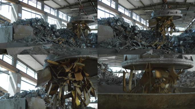 在回收设施将废金属送入碎纸机的工业磁铁