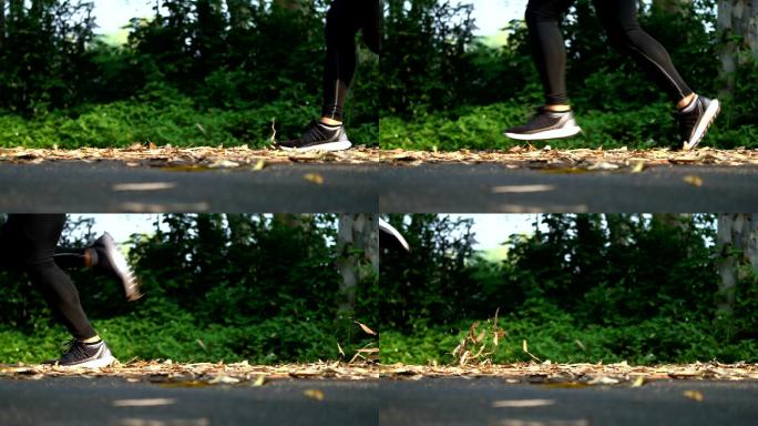 SLOMO LA CU runner踩在一堆树叶上