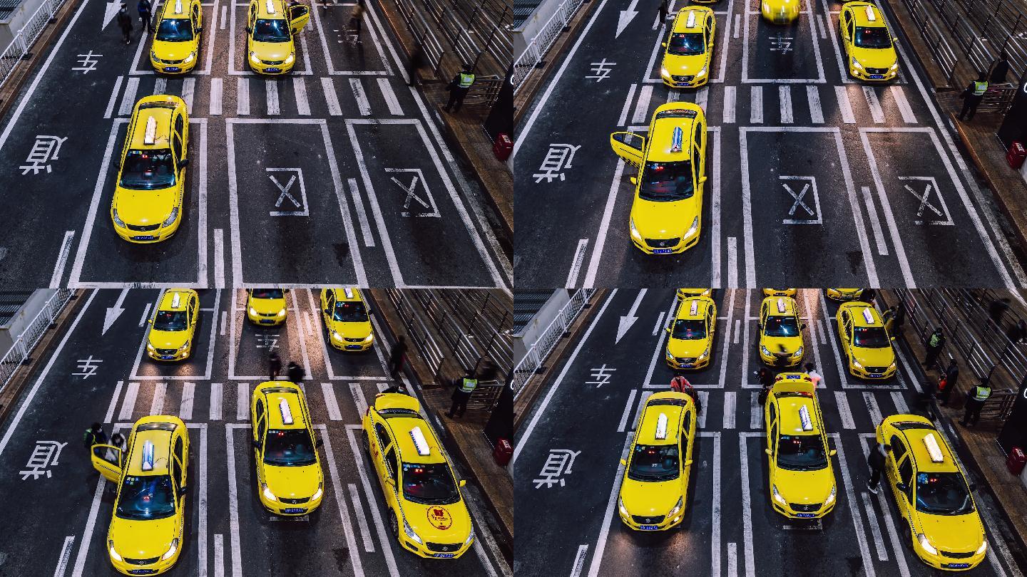 晚上，在机场出口，T/L TU繁忙的黄色出租车排队等候
