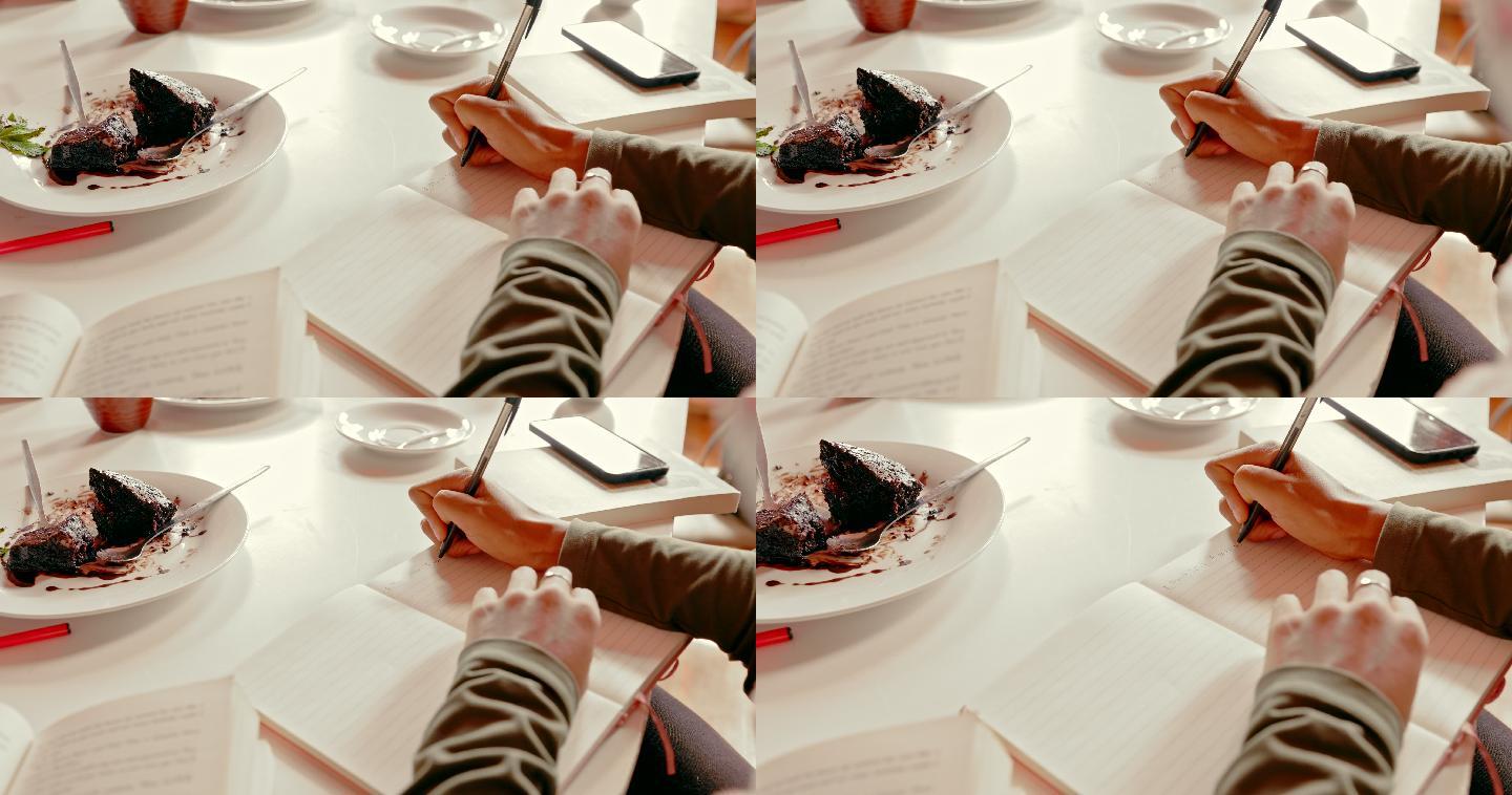 4k视频，一名无法辨认的女子在读书俱乐部会议上在笔记本上写字