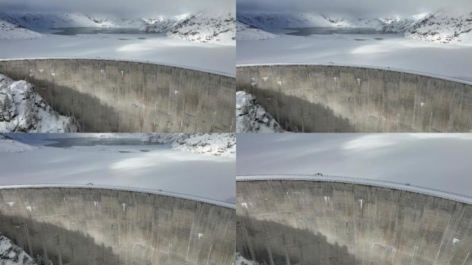 空中无人机拍摄的山中积雪的大坝