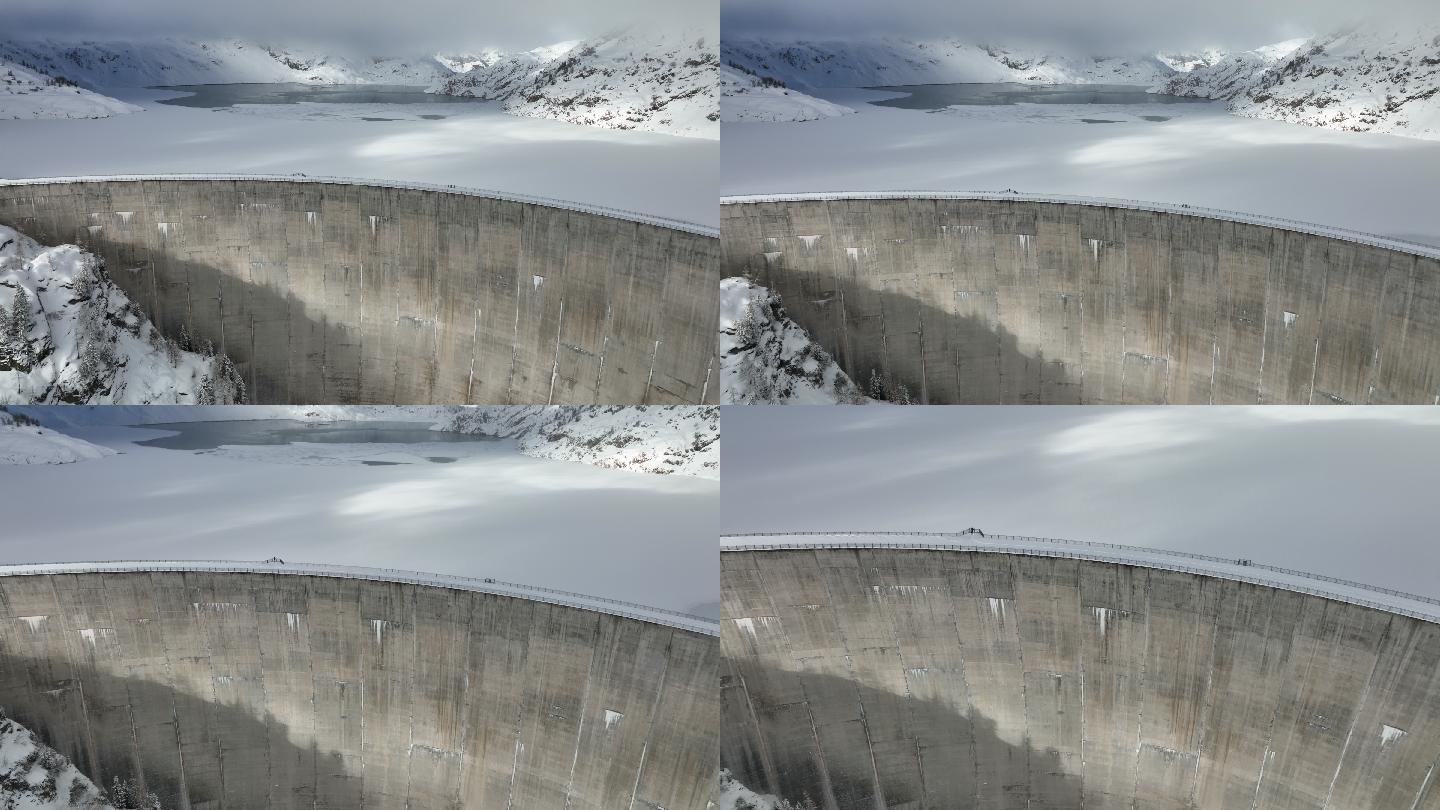 空中无人机拍摄的山中积雪的大坝