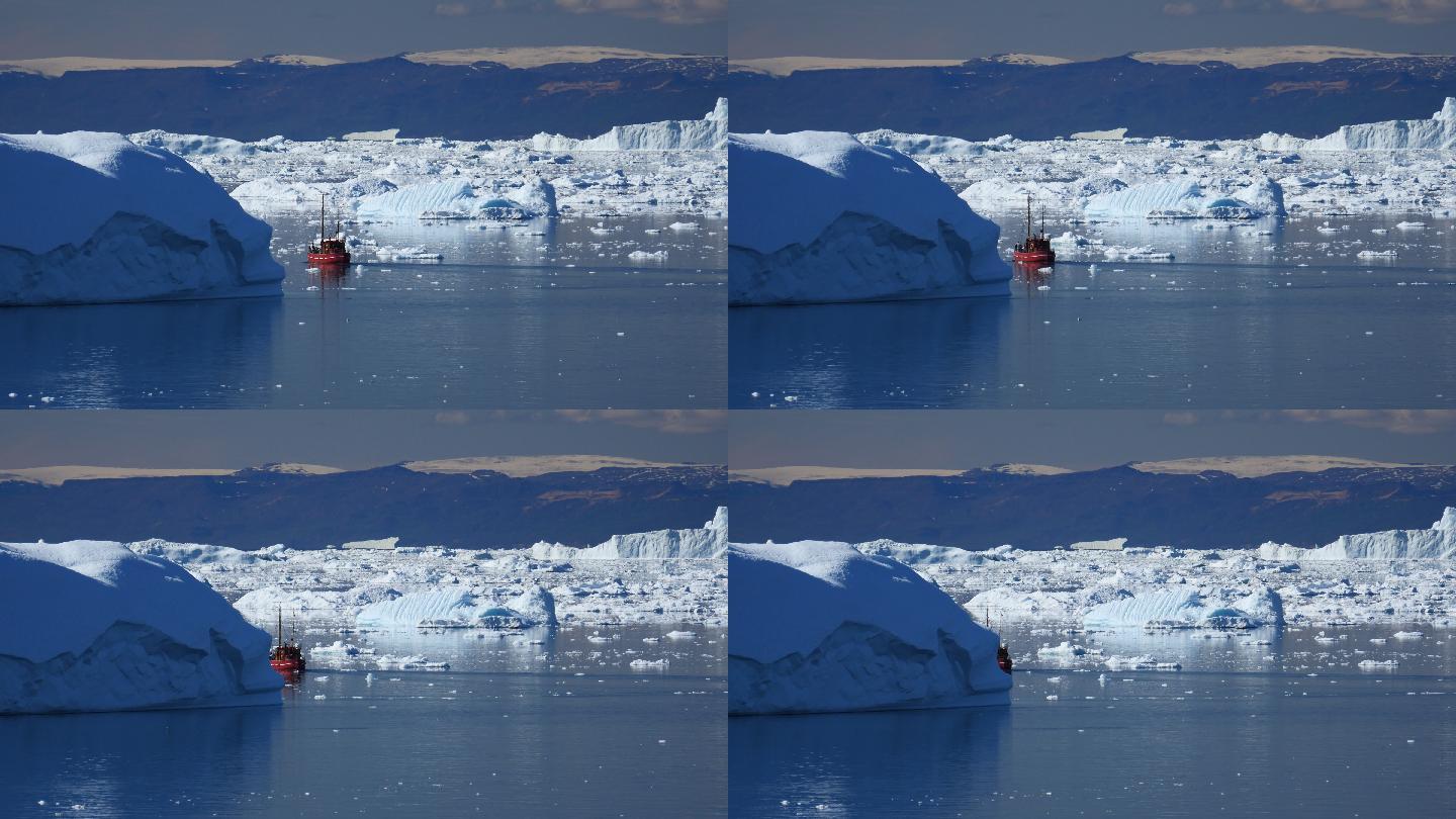 红色旅游船离开蓝色冰山