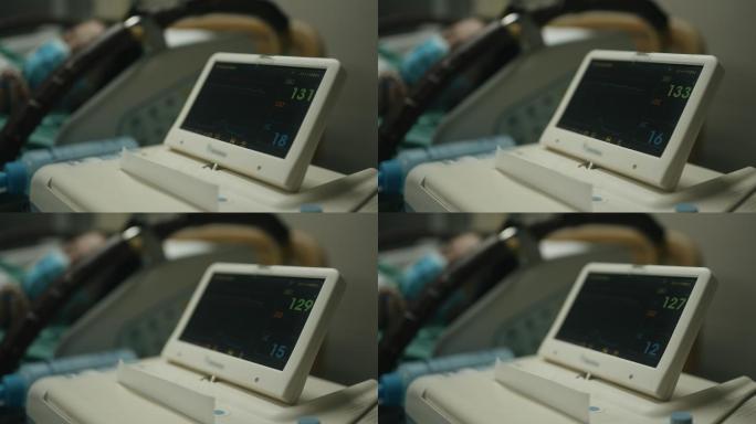 手术室心脏监护仪的特写镜头。ECG监护仪显示孕妇背景心率