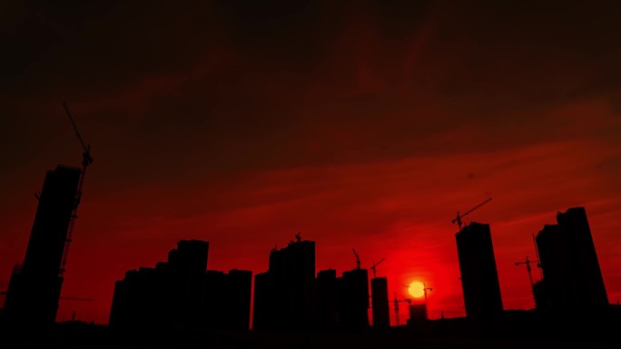 4K建筑工地城市建设日出日落夕阳塔吊剪影