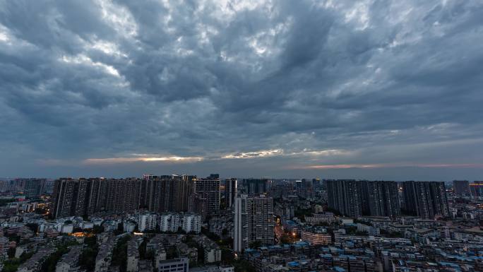 城市地平线鸟瞰大气震撼乌云日转夜万家灯火