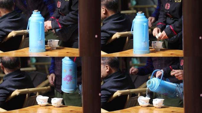 成都人民公园鹤鸣茶馆喝茶看报纸的市民