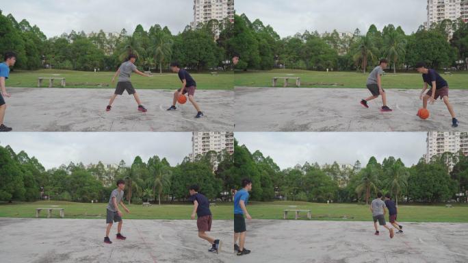 Z代亚裔中国少年在周末早上与朋友练习篮球比赛时挑战球员并投篮