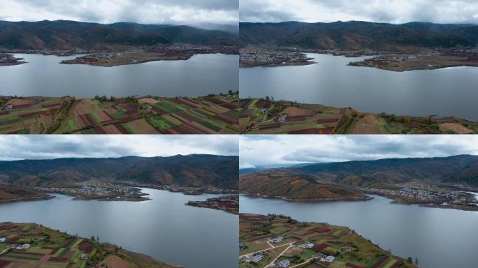 草原牧场湖泊视频香格里拉藏区藏族民房湖水