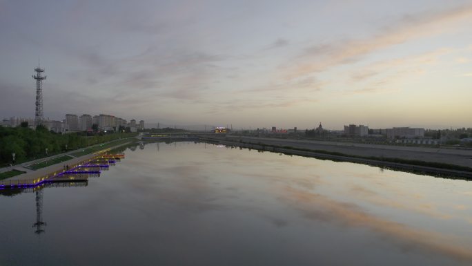 西北酒泉城市日落晚霞郊区河流