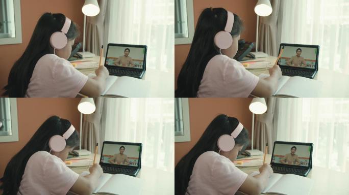 亚洲女孩在家学习视频通话