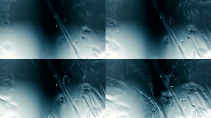 水在玻璃上结冰，形成一种霜状图案