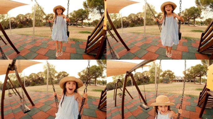 小女孩在公园里玩得很开心。