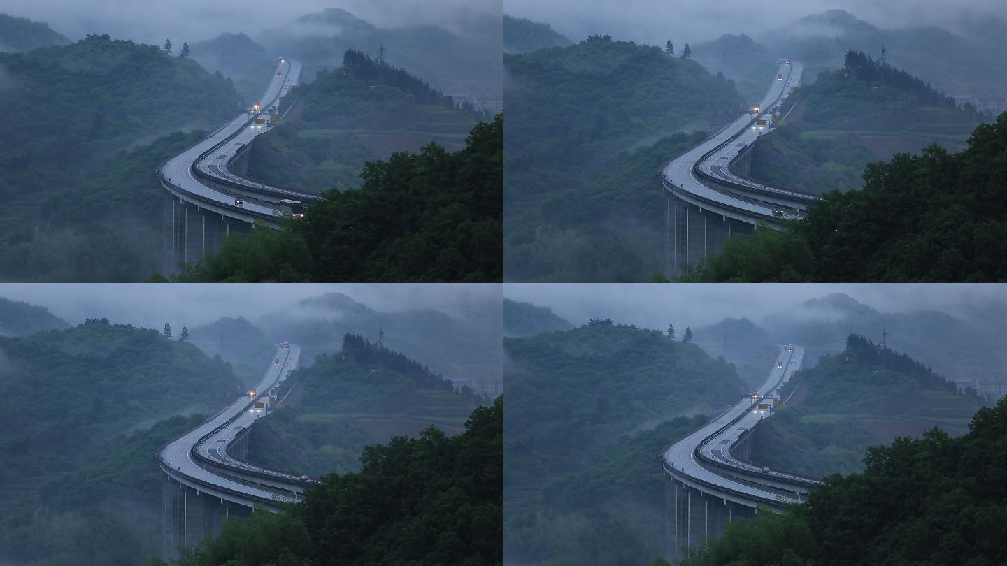 浙江山区高速高架桥雨天早晨云雾车辆物流