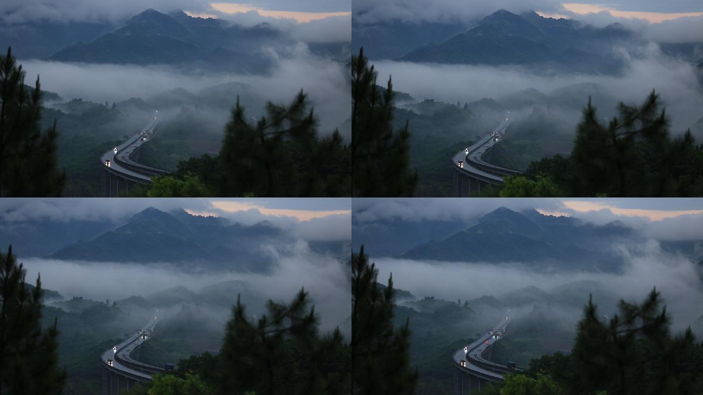 浙江山区高速早晨雨天雨雾车辆车灯物流高架