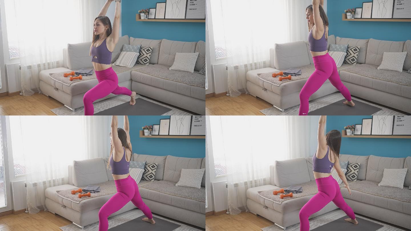 女运动员在家锻炼时伸展双腿