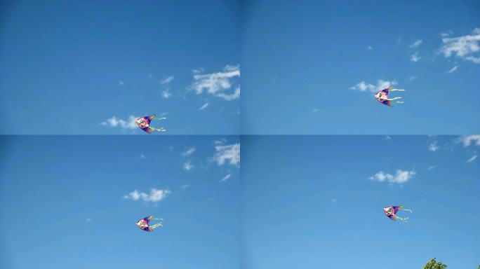 中景风筝在蓝天上飞翔