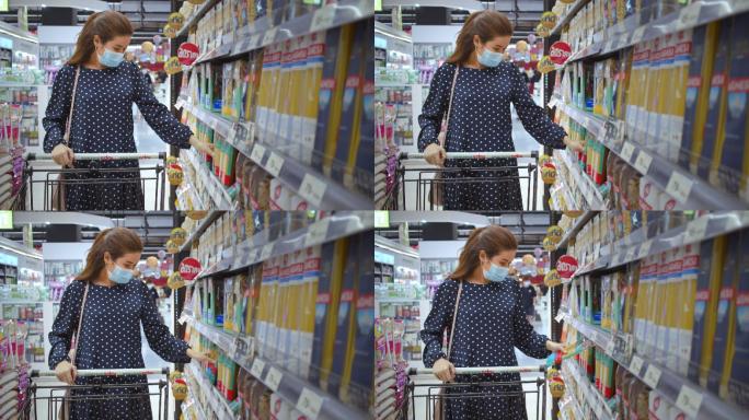 超级市场购物的女性阅读和选择食物
