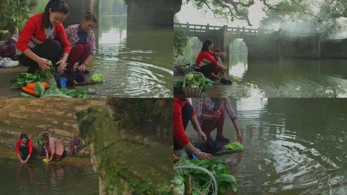 原创古村传统生活 女人在河边洗衣服